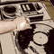 DJ Spinning Galaxy Book 12in Skin
