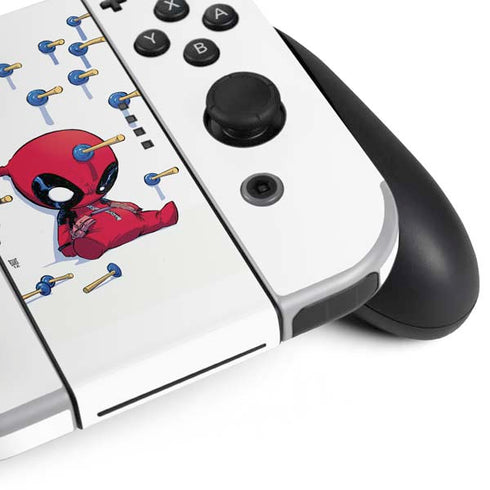 Marvel Deadpool Babypool Playing Nintendo Switch OLED (2021) Skin