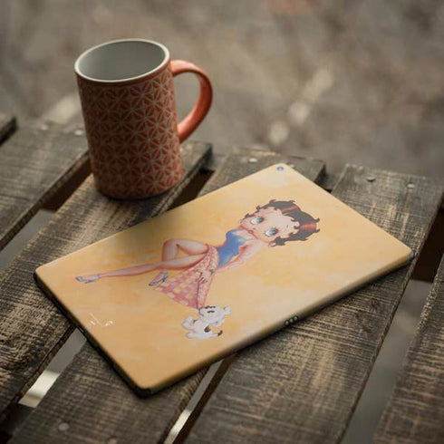 Betty Boop With Puppy Orange Background iPad Skins