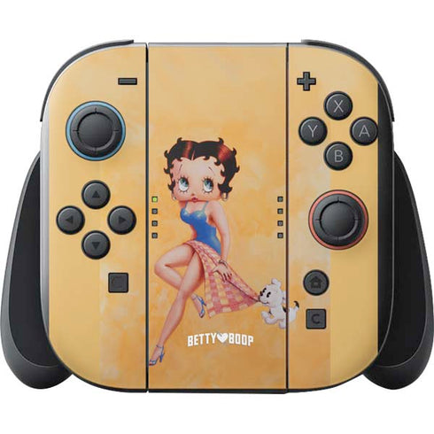 Betty Boop With Puppy Orange Background Nintendo Switch 2 (2025) with Joy-Con Skin