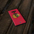 NHL Chicago Blackhawks Solid Background Galaxy Note 9 Skin