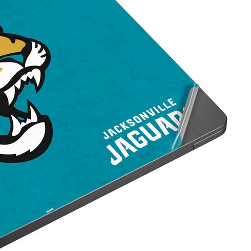 NFL Jacksonville Jaguars Distressed Surface Laptop 7 13.8in Skin
