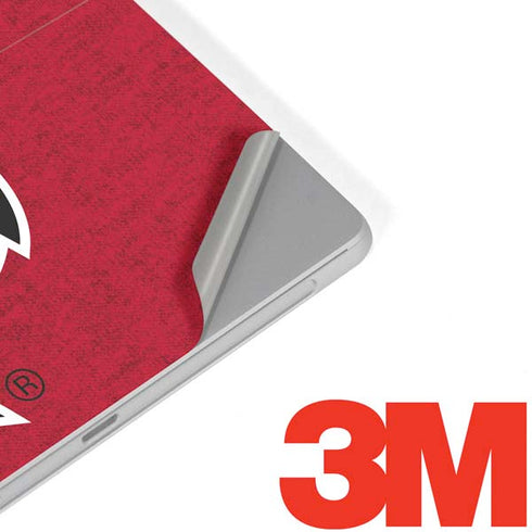 University of Louisville Red Background Surface Go Skin