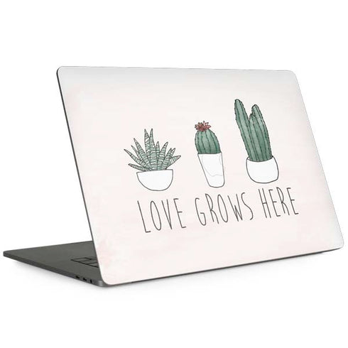 Love Grows Here MacBook Skins