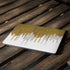 Paint Splatter Gold Apple MacBook Air Skin