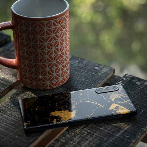 Black and Gold Scattered Marble Galaxy Note 10 Skin