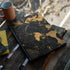 Black and Gold Scattered Marble MSI GS65 Stealth Laptop Skin