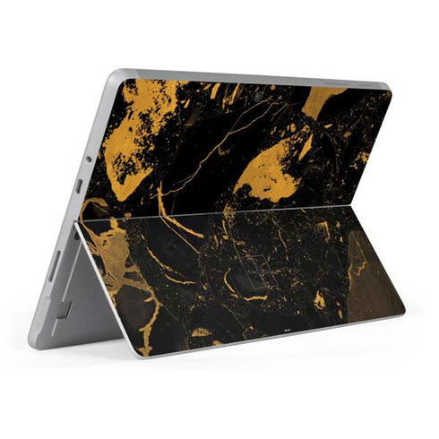Black and Gold Scattered Marble Surface Go Skin