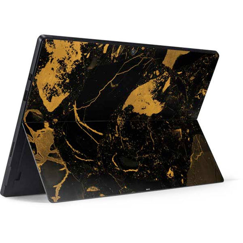 Black and Gold Scattered Marble Surface Pro 7 Skin