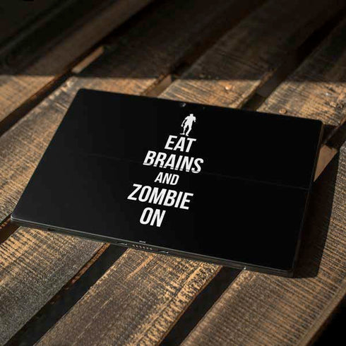 Eat Brains and Zombie On Black Surface Pro 7 Skin