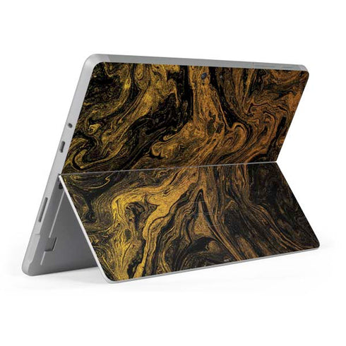 Gold and Black Marble Surface Go Skin