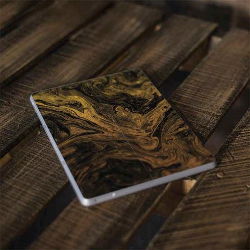 Gold and Black Marble Surface Go Skin