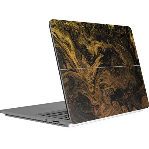 Gold and Black Marble Surface Laptop Studio Skin