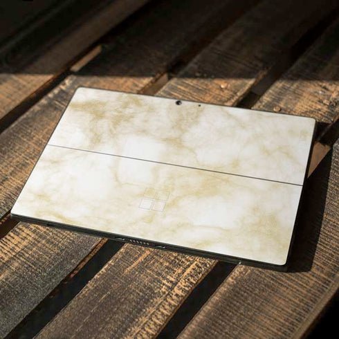 Gold and White Marble Surface Pro 7 Skin