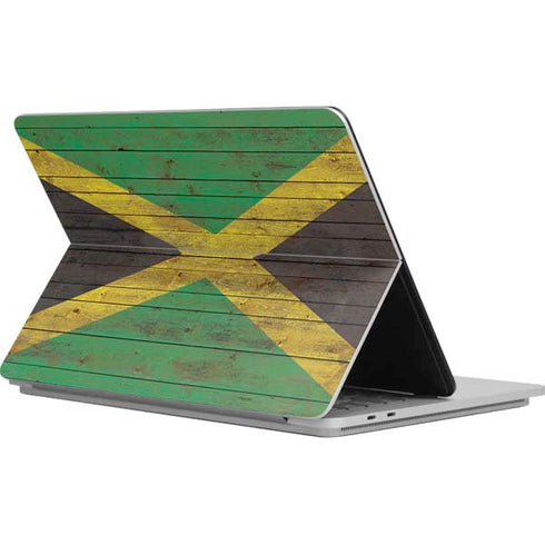 Jamaican Flag Dark Wood Surface Laptop Studio Skin