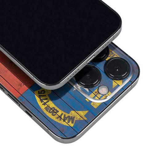 North Carolina Flag Dark Wood iPhone 14 Pro Max Skin