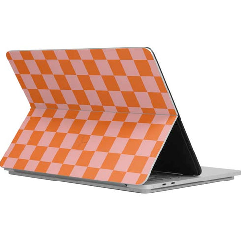 Orange Checkered Surface Laptop Studio Skin