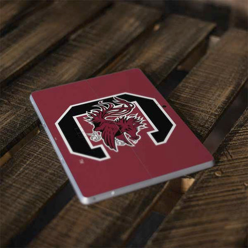 University of South Carolina Gamecocks Logo Red Surface Go Skin