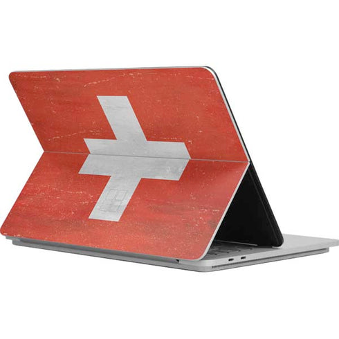 Switzerland Flag Distressed Surface Laptop Studio Skin