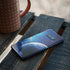 View of a Planet as it Looms in Close Orbit and with Rings Galaxy S10e Skin