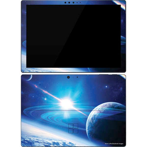 View of a Planet as it Looms in Close Orbit and with Rings Surface Pro 7 Skin