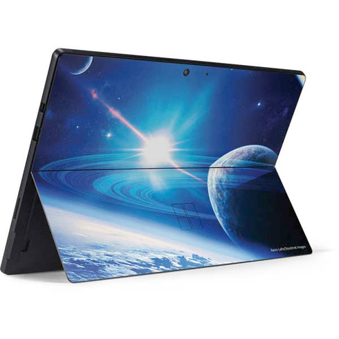 View of a Planet as it Looms in Close Orbit and with Rings Surface Pro 7 Skin