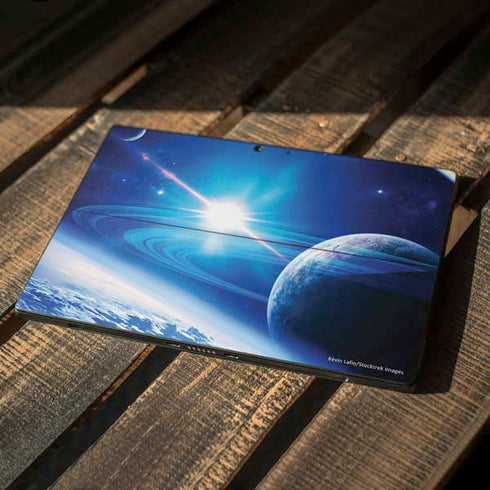 View of a Planet as it Looms in Close Orbit and with Rings Surface Pro 7 Skin