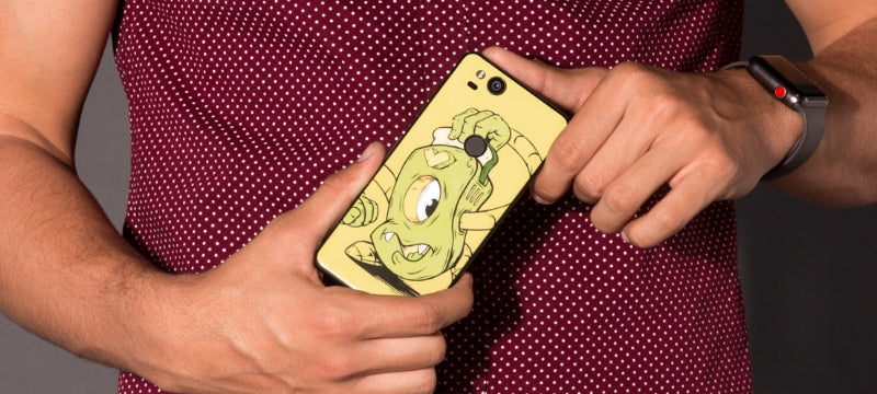 A person holding a custom phone skin