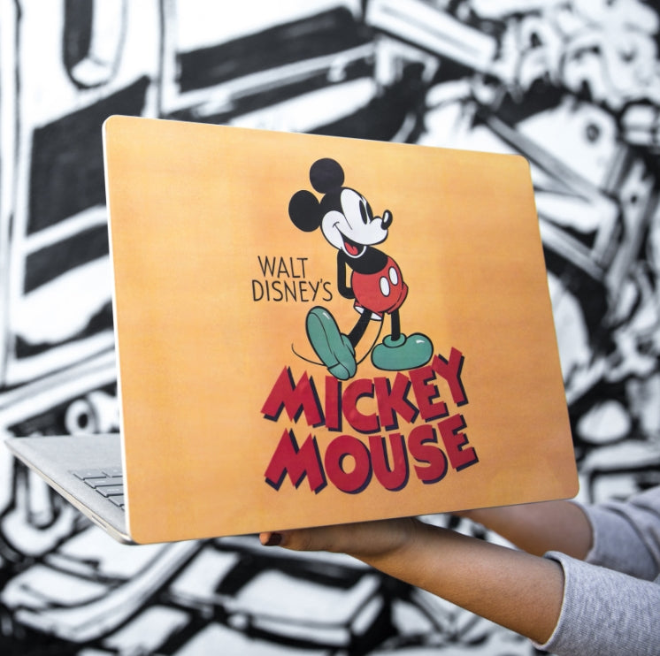 Macbook with custom Mickey Mouse skin
