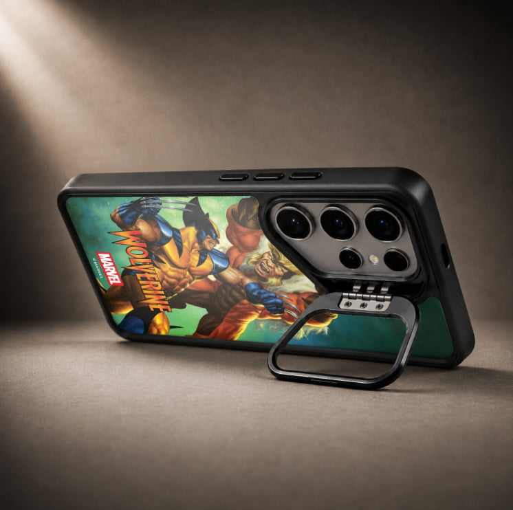 A black protective phone case with a colorful Marvel Wolverine comic print on the back, shown with a detachable black metal ring stand on a dark brown textured background.