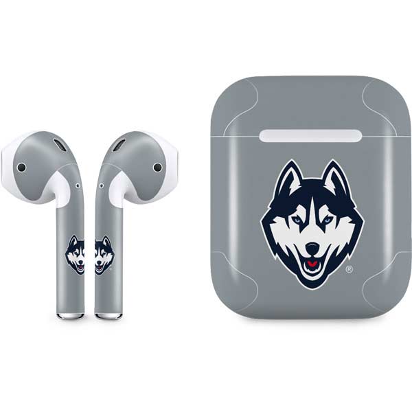 Gray AirPods case skin with blue husky mascot logo and white cutout areas