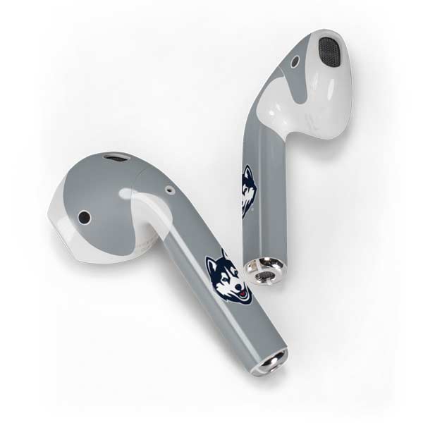 Gray AirPods earpiece skin with blue husky logo on the side, curved design